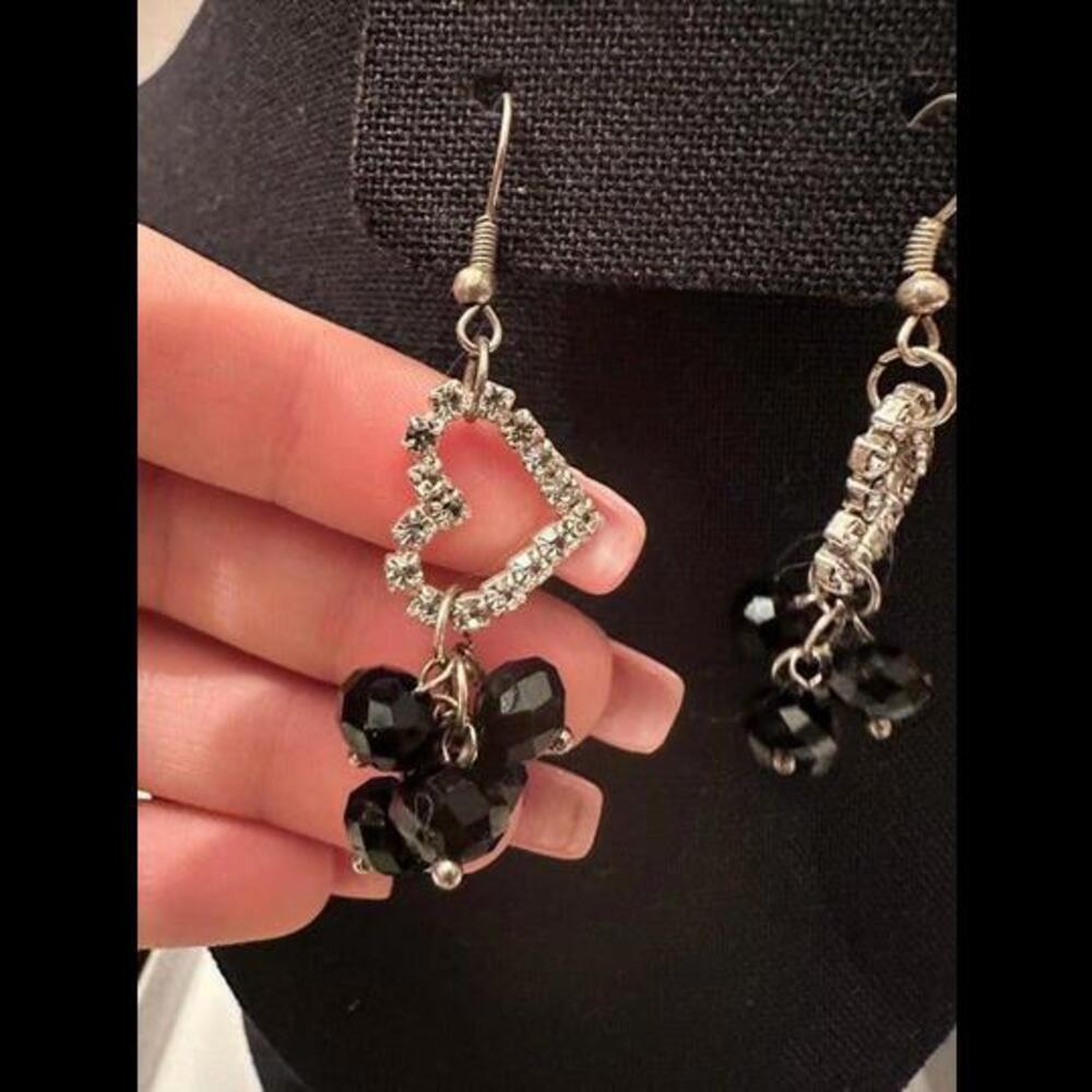 Add Elegance to Your Look with Dangling Heart and Black Jewels Earrings!